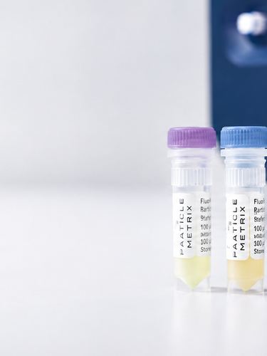 Particle Metrix consumables for nanoparticle analysis with sample vials in front of a ZetaView® instrument.
